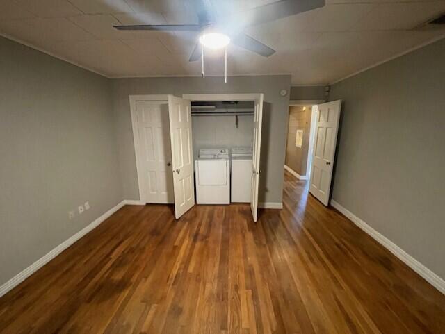 2411 30th Street Lubbock, TX 79411 - Photo 10 of 25 an empty room with wooden floor and windows