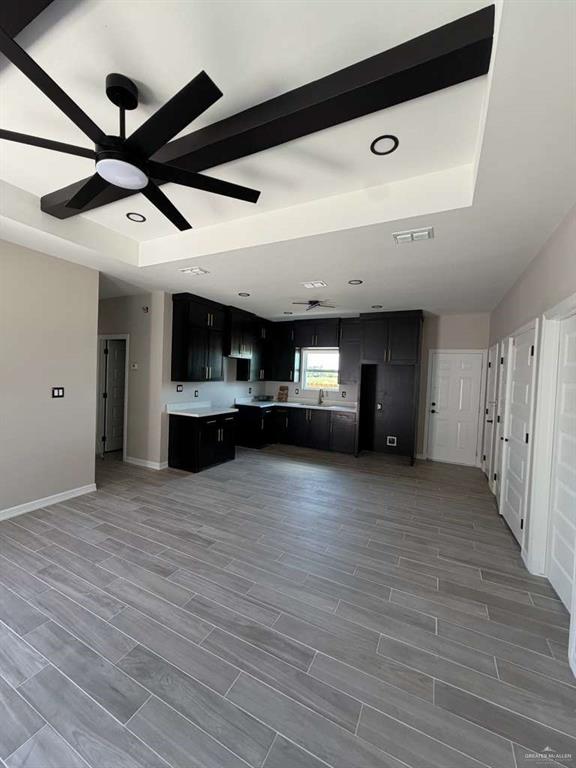 Lot 23 Farrell Road, Unit 1 Weslaco, TX 78596 - Photo 2 of 9 a view of large windows and a ceiling fan in a room