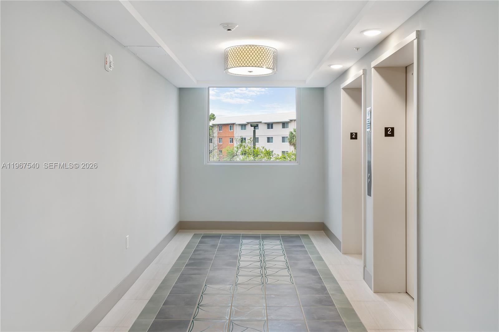 19755 Southwest 110th Court, Unit 513 Miami, FL 33157 - Photo 11 of 17 Elevator Landings