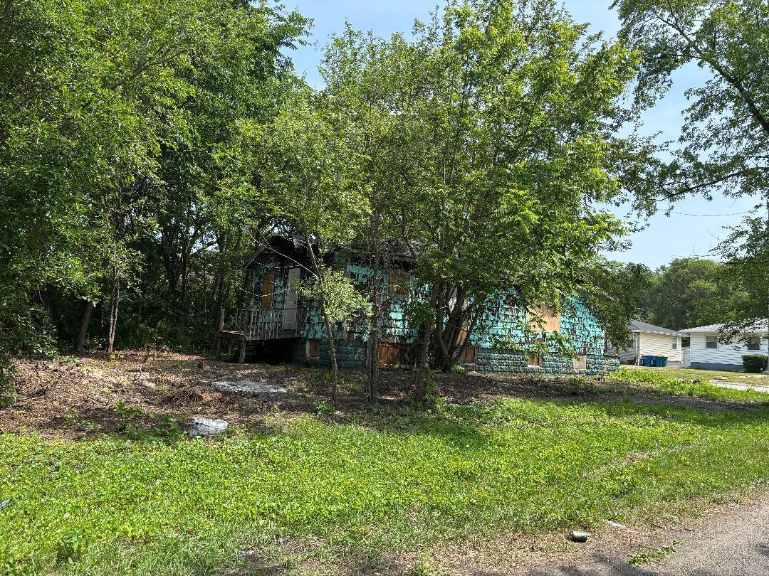 982 Ralston Street Gary, IN 46406 - Photo 4 of 5 a view of outdoor space with deck and yard