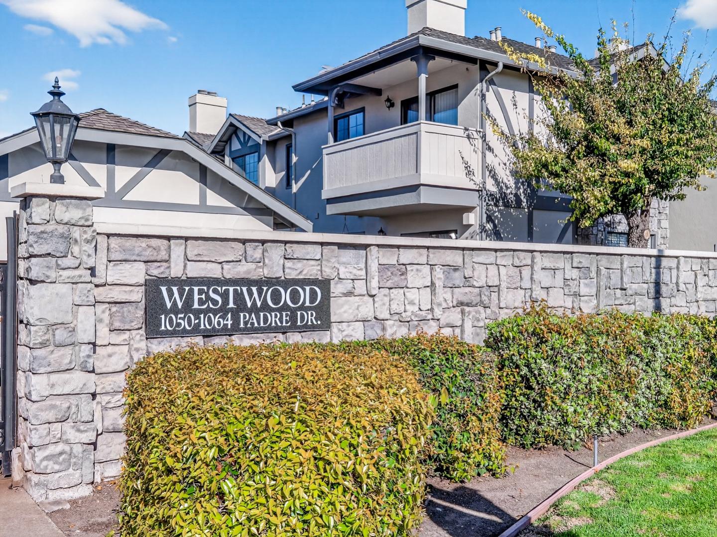 1056 Padre Drive, Unit 8 Salinas, CA 93901 - Photo 1 of 43 a sign on the side of a building