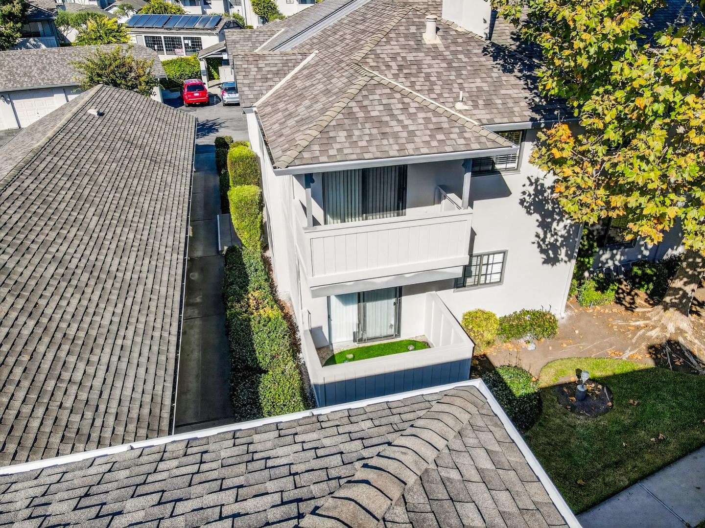 1056 Padre Drive, Unit 8 Salinas, CA 93901 - Photo 12 of 43 a view of a house with a garage