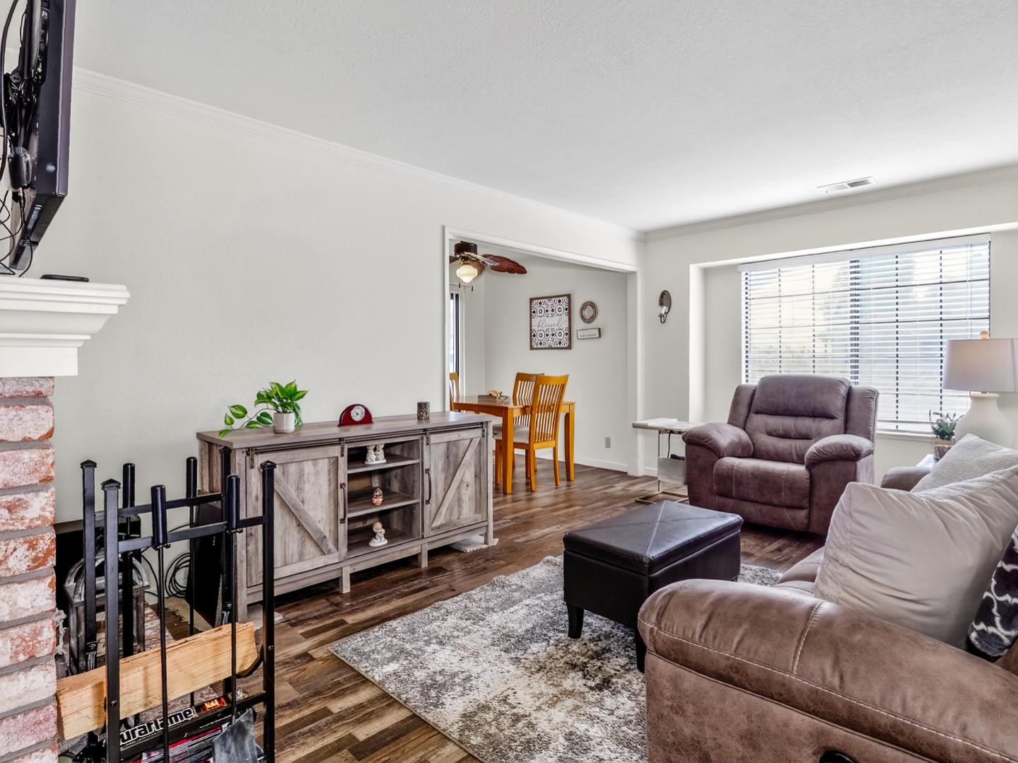 1056 Padre Drive, Unit 8 Salinas, CA 93901 - Photo 14 of 43 a living room with furniture and wooden floor