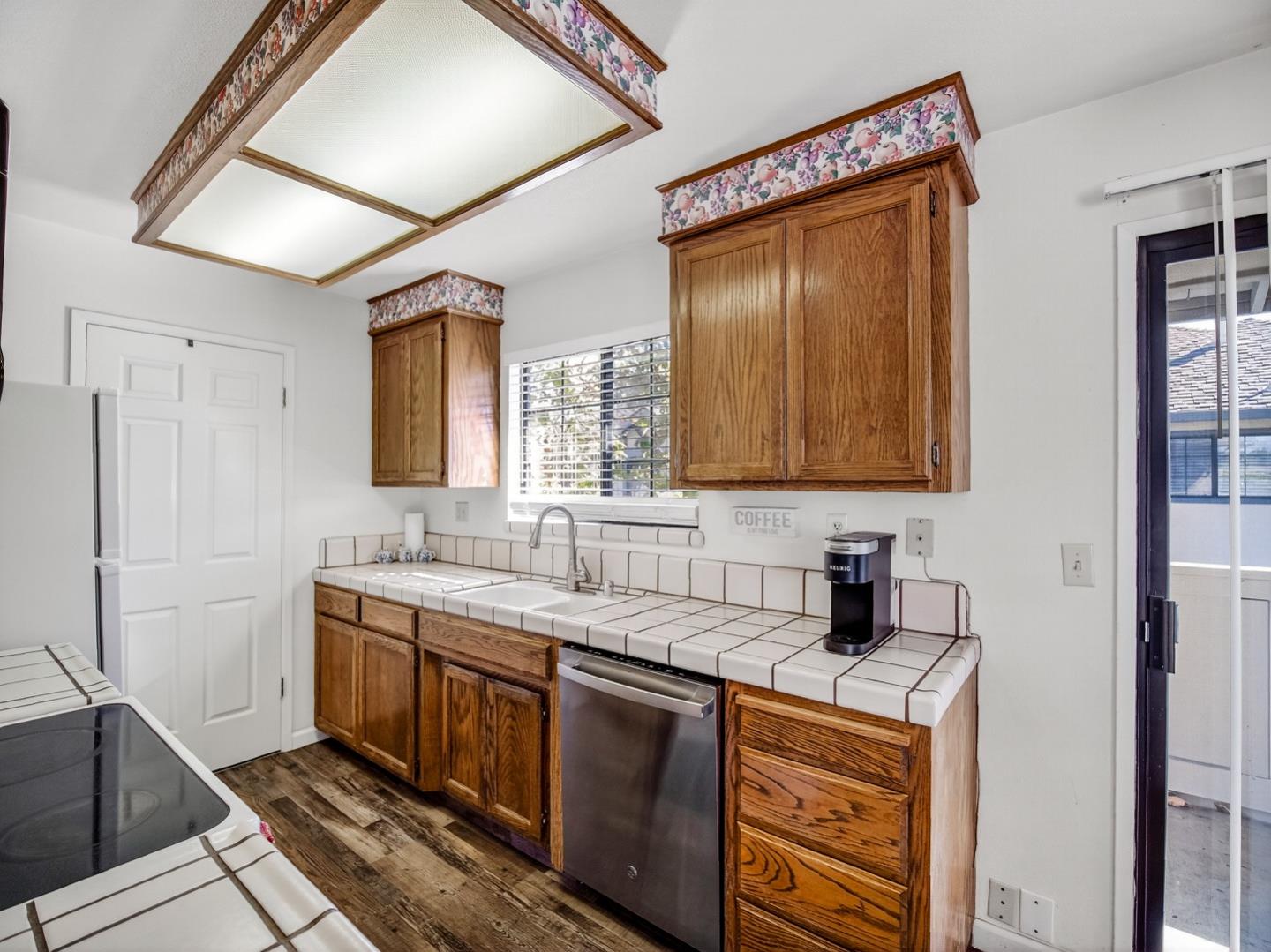 1056 Padre Drive, Unit 8 Salinas, CA 93901 - Photo 22 of 43 a bathroom with a sink and a mirror