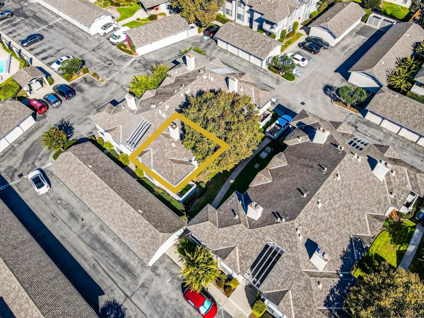 1056 Padre Drive, Unit 8 Salinas, CA 93901 - Photo 33 of 43 an aerial view of a pool patio outdoor seating and outdoor kitchen