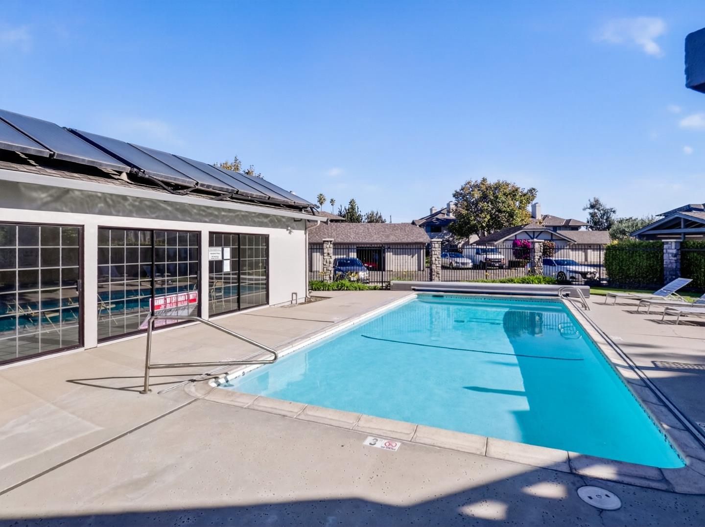 1056 Padre Drive, Unit 8 Salinas, CA 93901 - Photo 41 of 43 a view of a house with a swimming pool