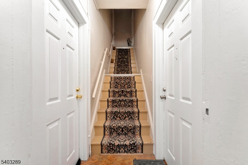 49 Caldwell Place, Unit 5 Springfield, NJ 07081 - Photo 20 of 41 a view of a hallway with windows and furniture