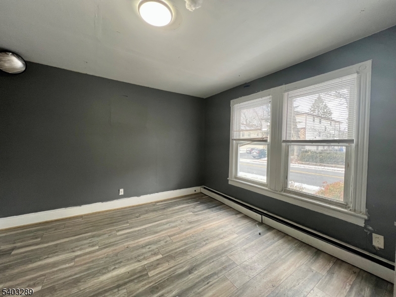 49 Caldwell Place, Unit 5 Springfield, NJ 07081 - Photo 24 of 41 a view of an empty room with a window