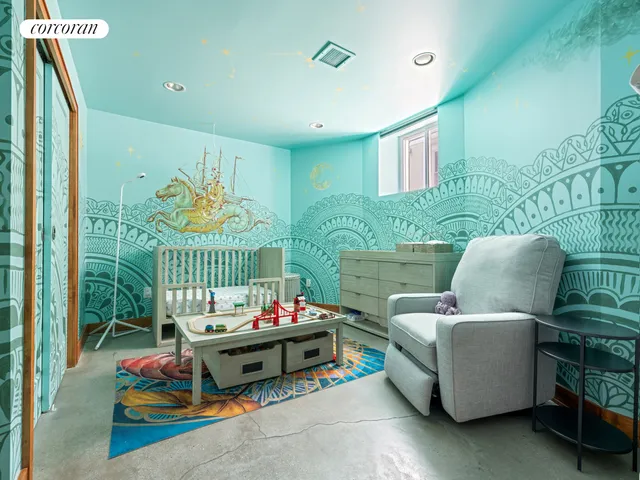 a bedroom with furniture and a floor to ceiling window