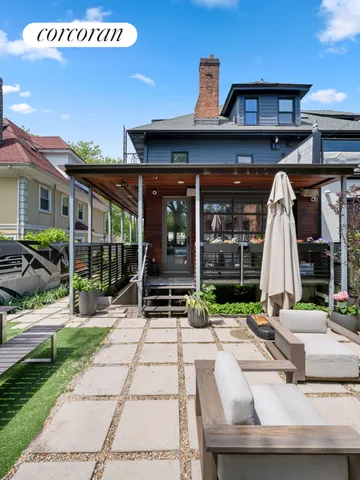 a view of a bench in the backyard