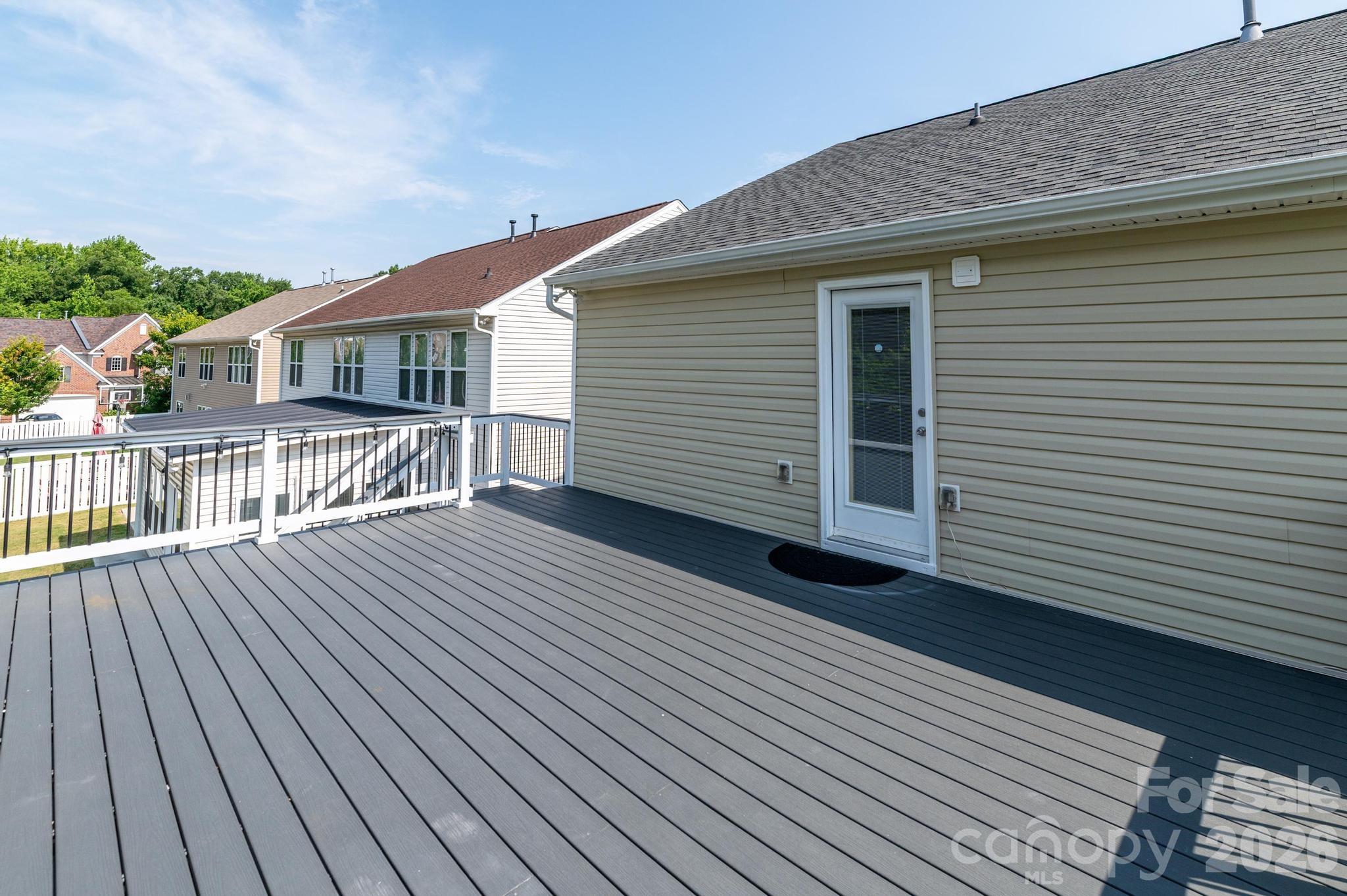 8212 Ruby Valley Road Charlotte, NC 28277 - Photo 8 of 40 a view of house with wooden deck