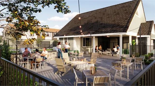 a view of a patio with couches table and chairs and potted plants