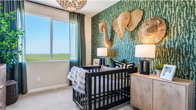 a bathroom with a toilet a sink and a mirror