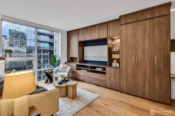 a living room with a couch and a flat screen tv