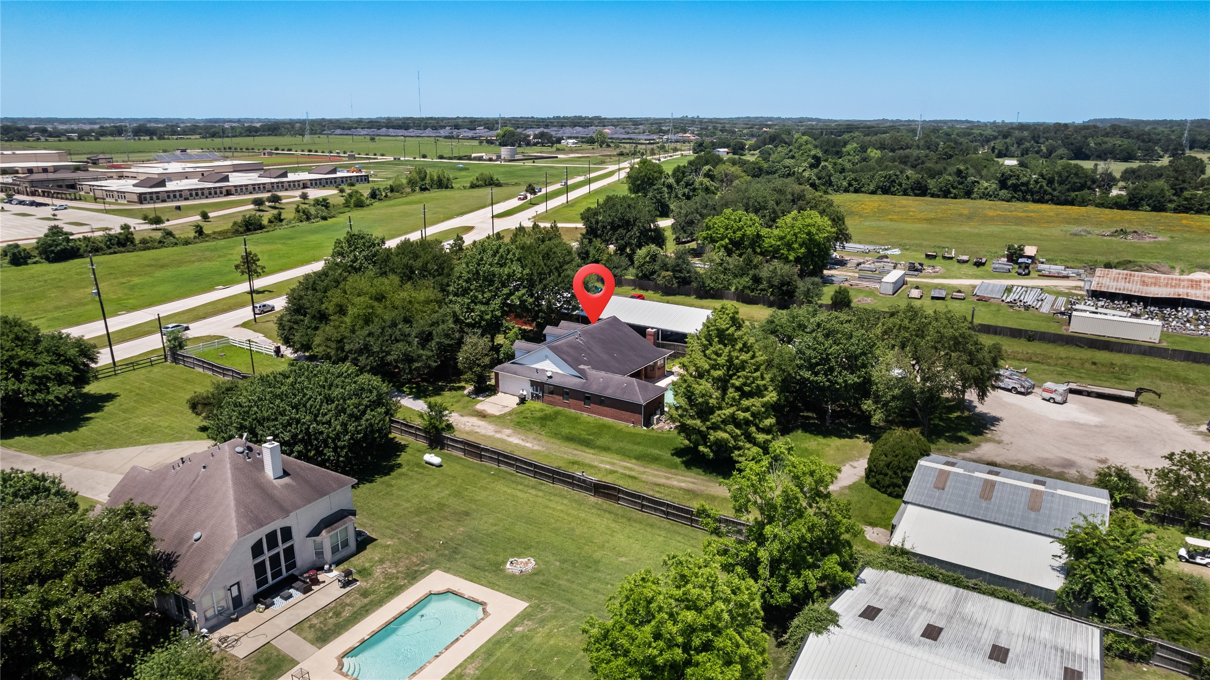 20240 Cypress Rosehill Road Tomball, TX 77377 - Photo 5 of 26 an aerial view of residential houses with outdoor space and river