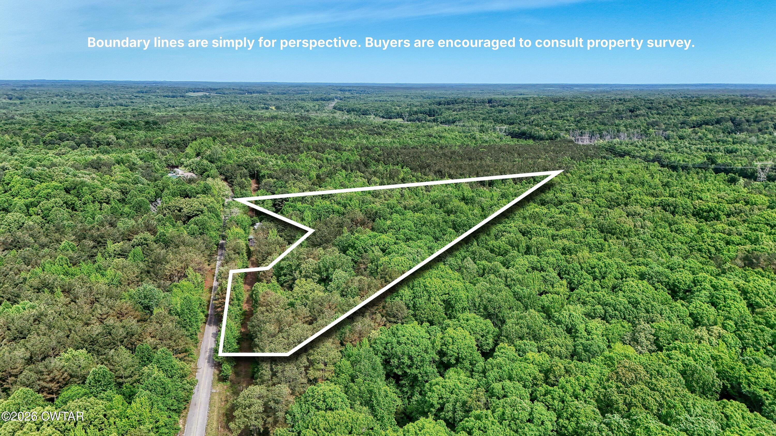 810 Sawyers Mill Road Bruceton, TN 38317 - Photo 2 of 14 a view of a field