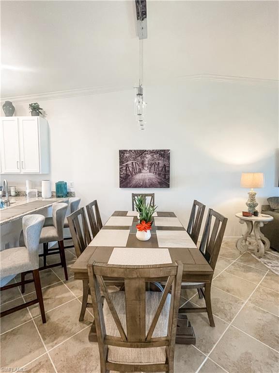 16000 Grassland Lane, Unit 3127 Babcock Ranch, FL 33982 - Photo 11 of 44 a view of a dining room with furniture