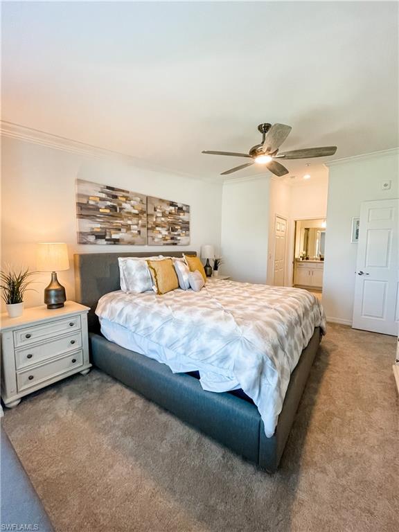 16000 Grassland Lane, Unit 3127 Babcock Ranch, FL 33982 - Photo 14 of 44 a spacious bedroom with a bed and a dresser