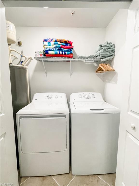 16000 Grassland Lane, Unit 3127 Babcock Ranch, FL 33982 - Photo 21 of 44 a utility room with dryer and washer