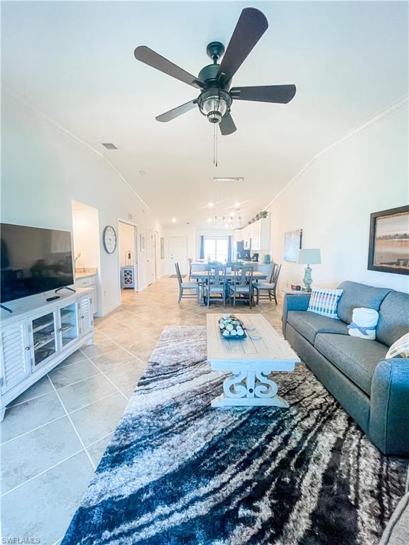 16000 Grassland Lane, Unit 3127 Babcock Ranch, FL 33982 - Photo 6 of 44 a living room with furniture and a flat screen tv