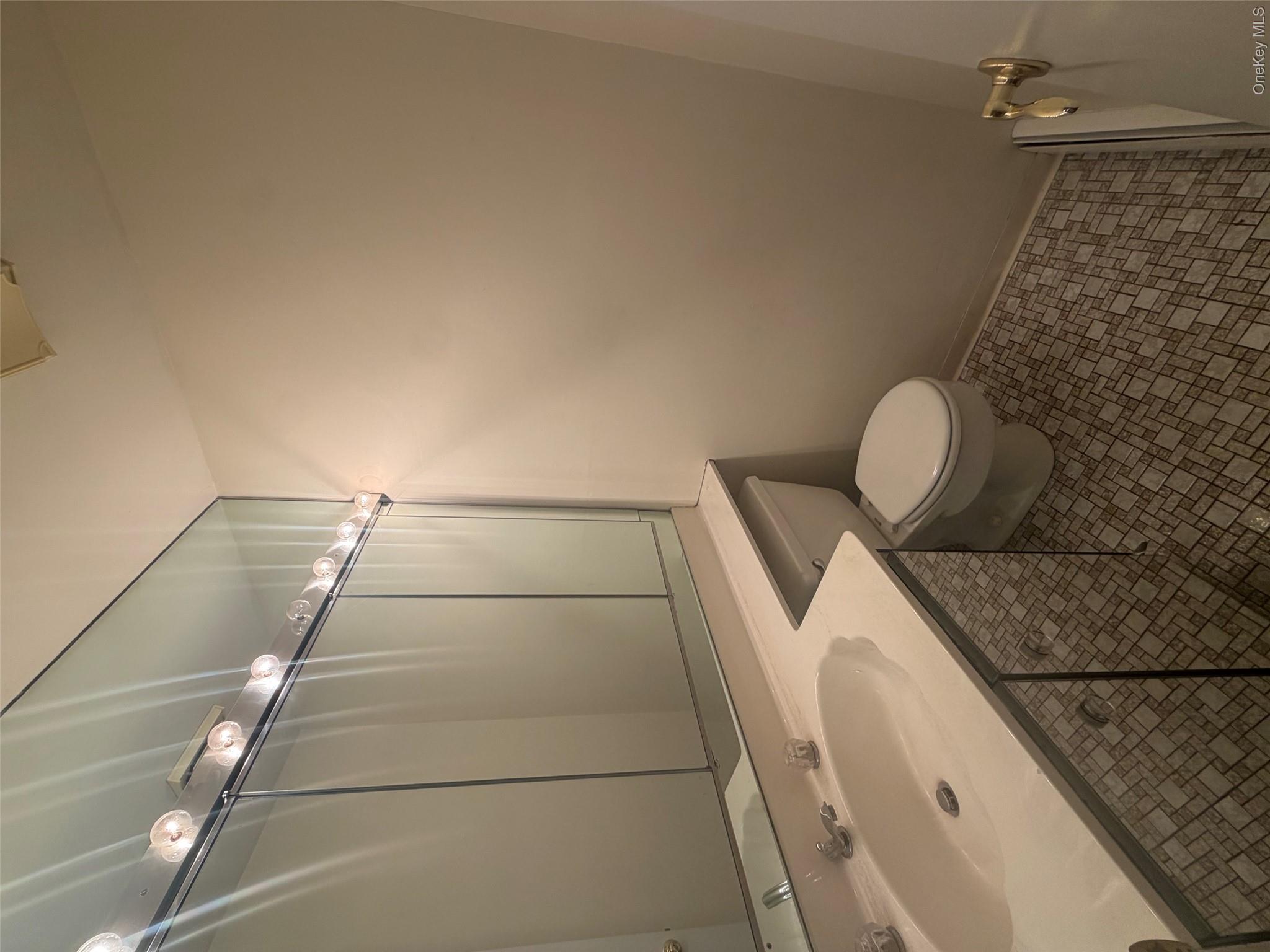 75 Greenway Close, Unit 75 Rye Brook, NY 10573 - Photo 11 of 23 First floor half bath