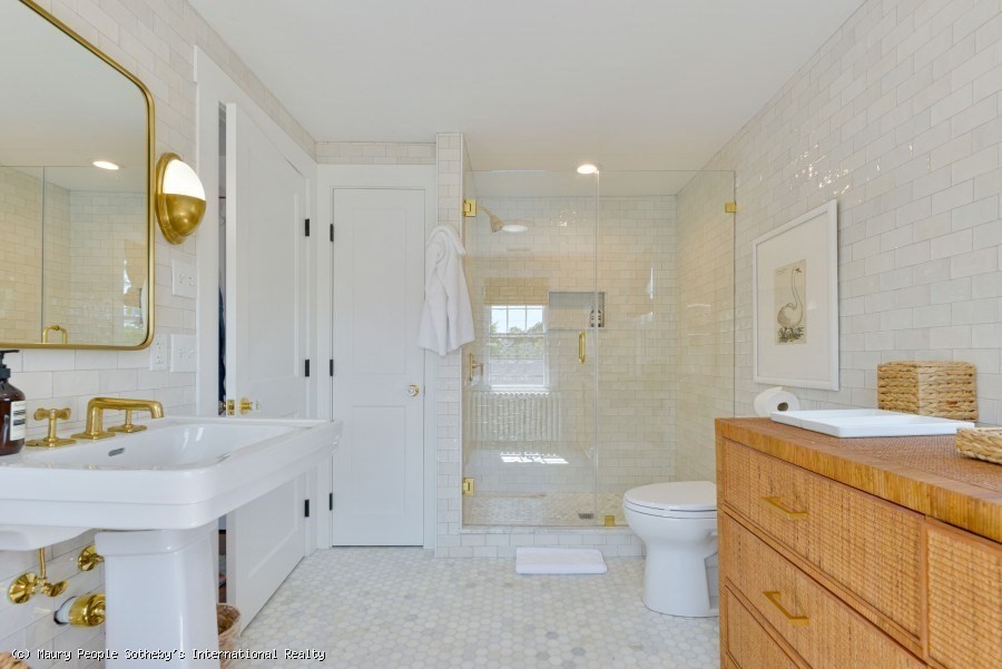 3 North Beach Street Nantucket, MA 02554 - Photo 8 of 13 a bathroom with a sink a toilet and shower