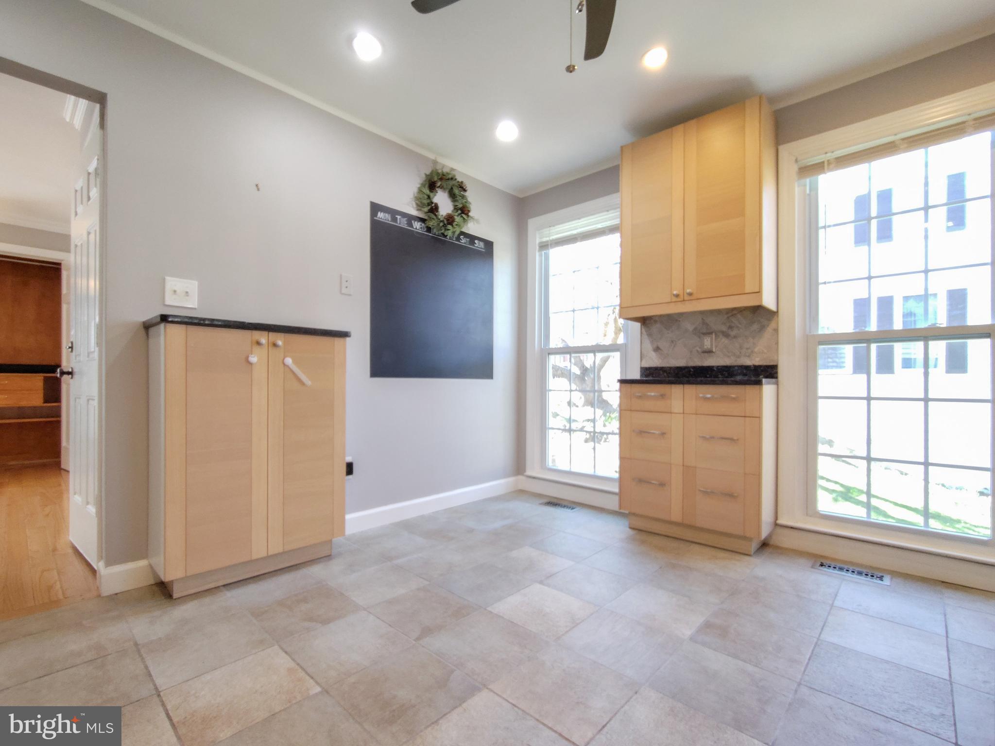 9513 Cherry Oak Court Burke, VA 22015 - Photo 13 of 40 an empty room with windows and closet