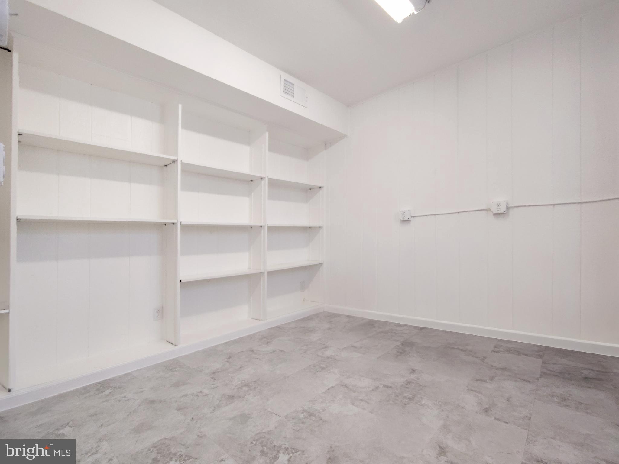 9513 Cherry Oak Court Burke, VA 22015 - Photo 35 of 40 a view of a room with shelf