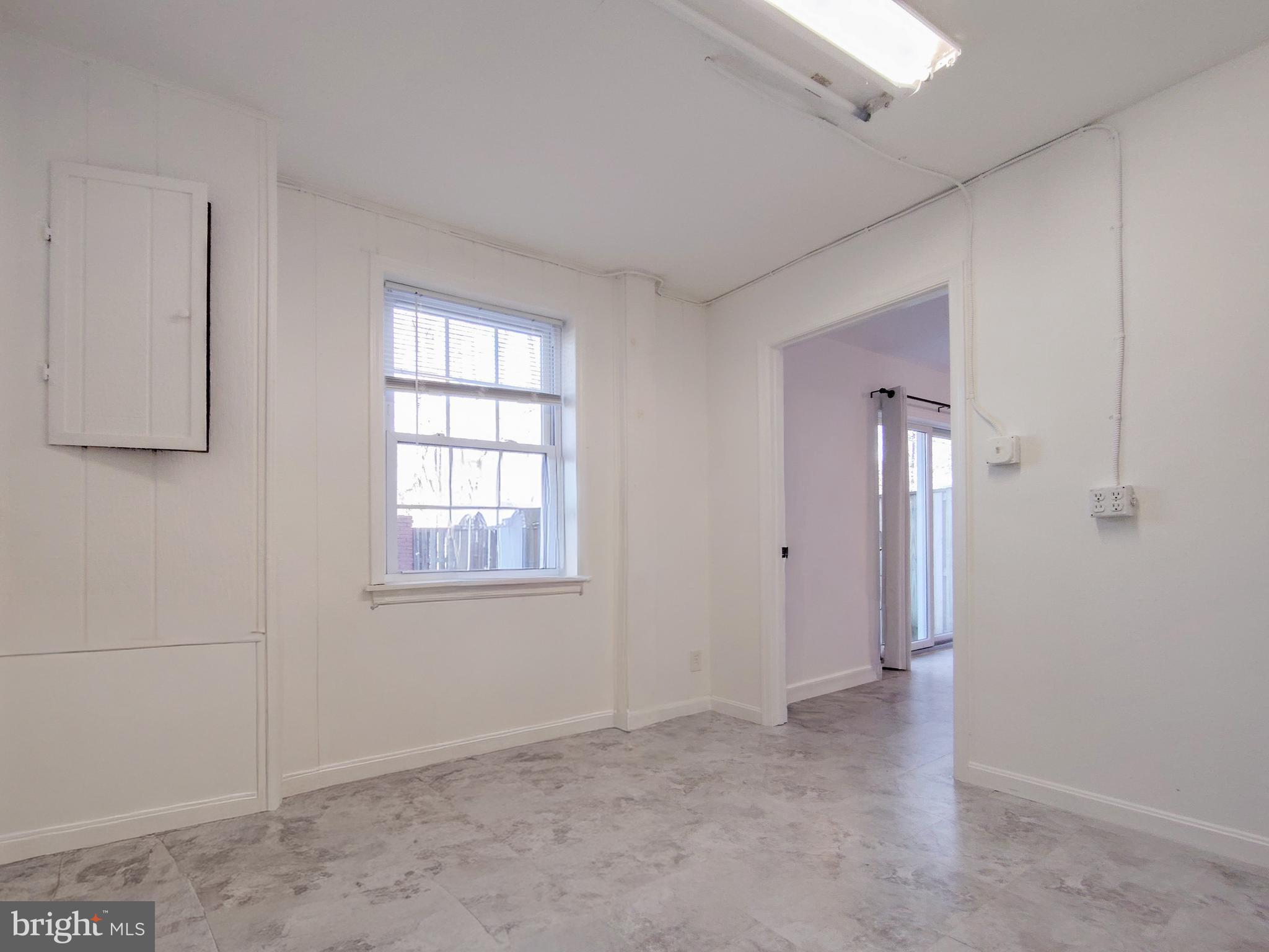 9513 Cherry Oak Court Burke, VA 22015 - Photo 37 of 40 a view of an empty room with a window