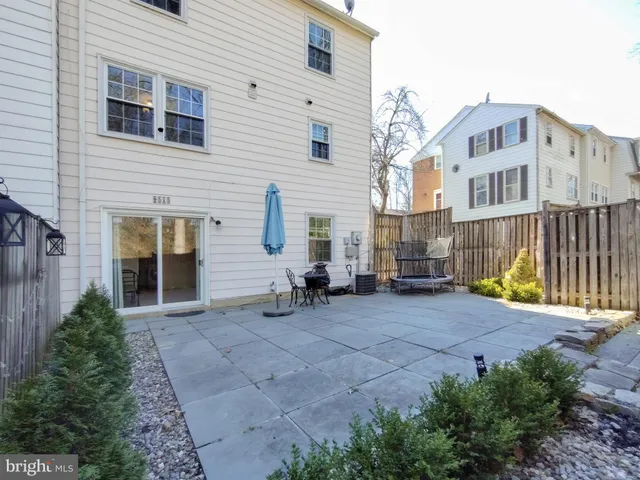 a view of a house with sitting area and furniture