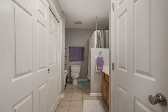 a bathroom with a sink and toilet