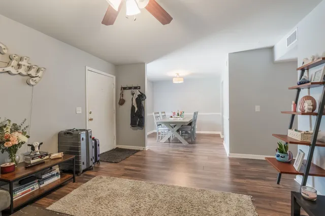 a view of a livingroom with furniture and a livingroom