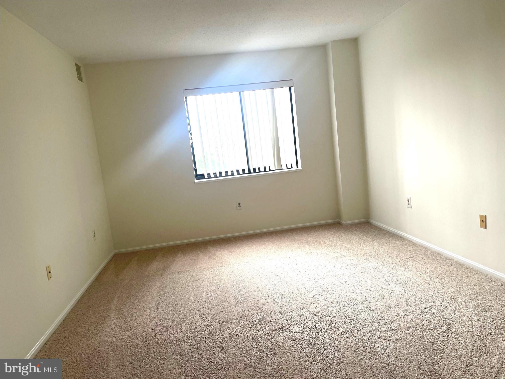 15100 Interlachen Drive, Unit 4901 Silver Spring, MD 20906 - Photo 13 of 31 Primary bedroom