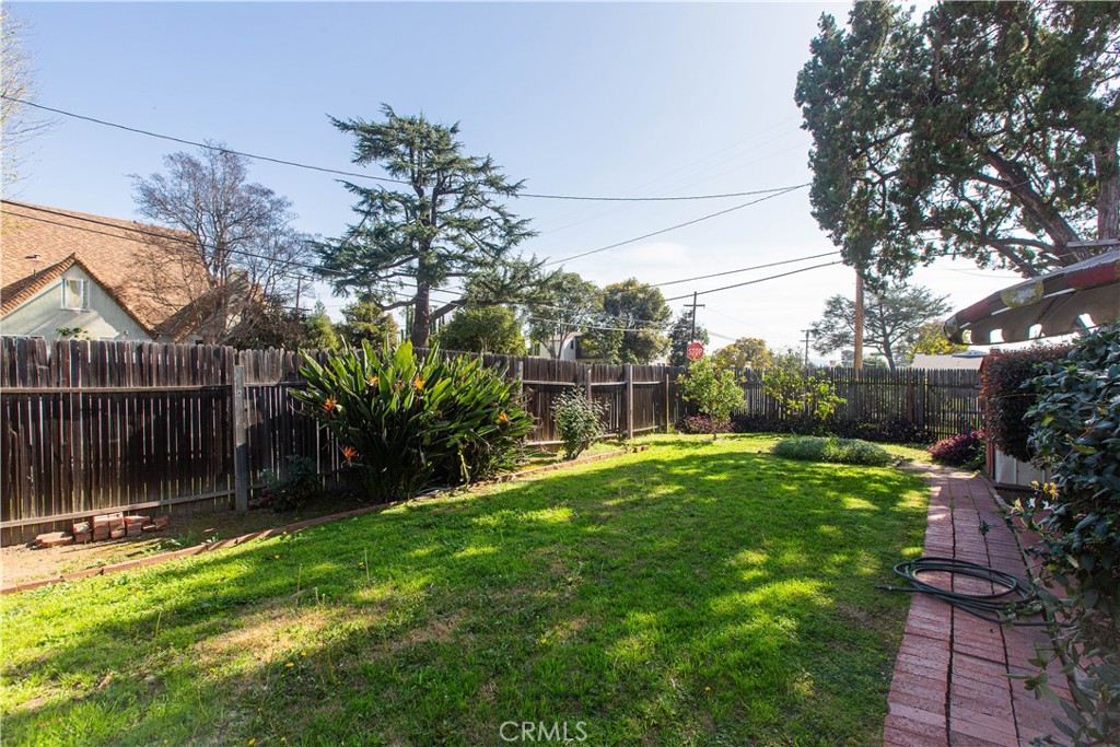 9855 La Rosa Drive Temple City, CA 91780 - Photo 12 of 39 a view of a backyard with plants and large trees