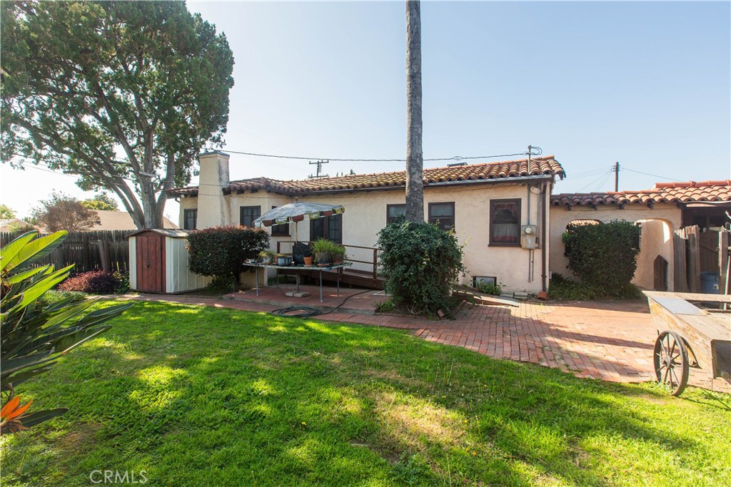 9855 La Rosa Drive Temple City, CA 91780 - Photo 13 of 39 a view of a house with a backyard and a chairs