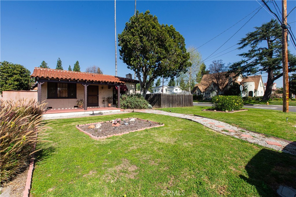 9855 La Rosa Drive Temple City, CA 91780 - Photo 2 of 39 a view of a house with swimming pool and a yard