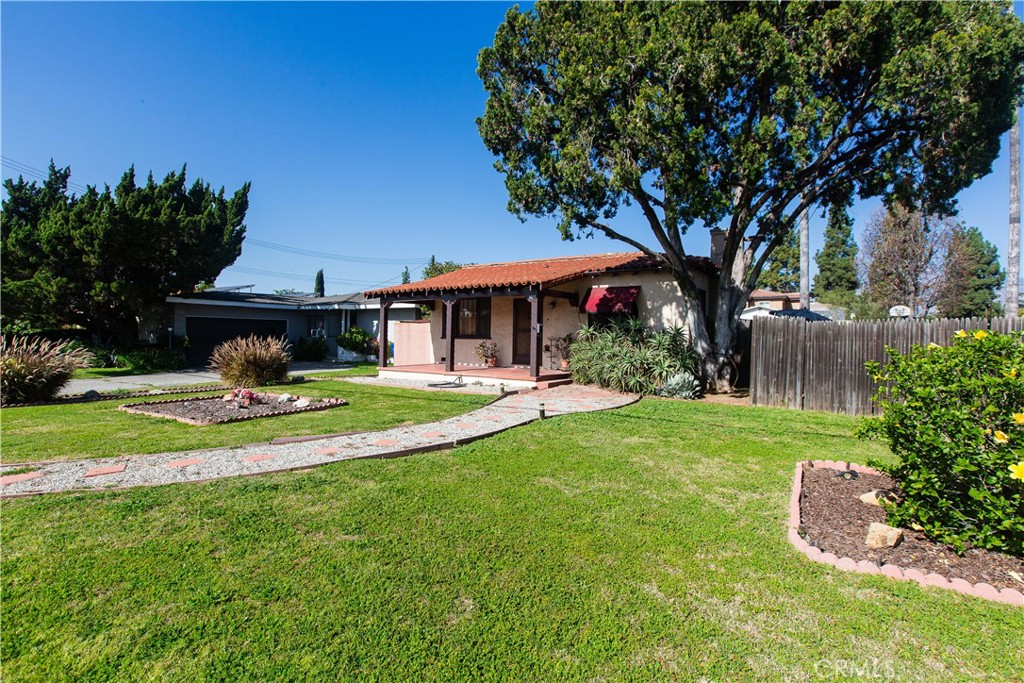 9855 La Rosa Drive Temple City, CA 91780 - Photo 39 of 39 a front view of a house with garden and a yard