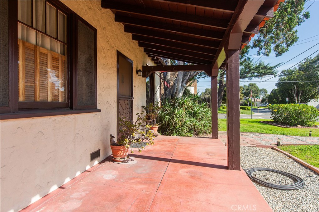 9855 La Rosa Drive Temple City, CA 91780 - Photo 5 of 39 a view of a room with a large trees and plants