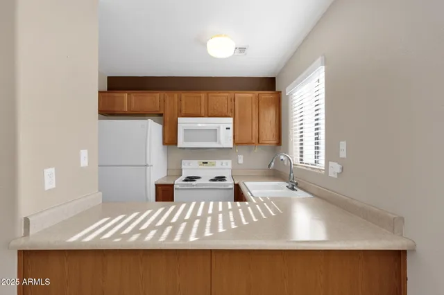 a living room with a couch and window