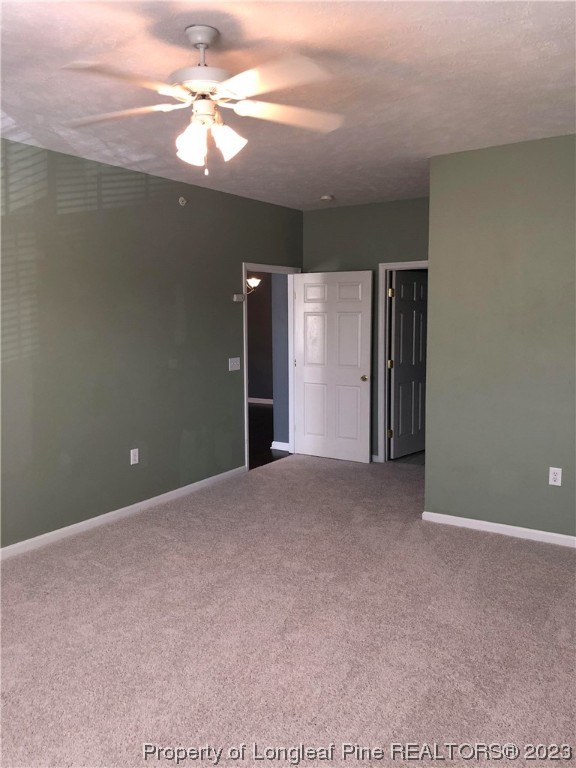 649 Brandermill Road, Unit 203 Fayetteville, NC 28314 - Photo 15 of 26 a view of a livingroom with a chandelier fan
