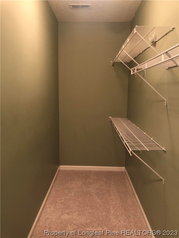 649 Brandermill Road, Unit 203 Fayetteville, NC 28314 - Photo 16 of 26 a view of a room with racks on the wall
