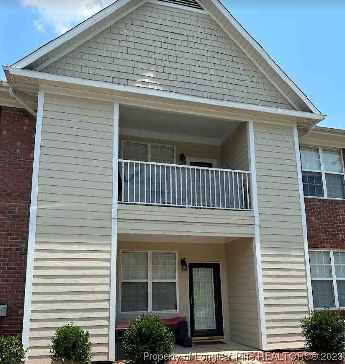 649 Brandermill Road, Unit 203 Fayetteville, NC 28314 - Photo 2 of 26 a front view of a house