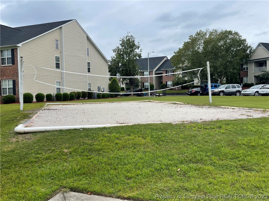 649 Brandermill Road, Unit 203 Fayetteville, NC 28314 - Photo 25 of 26 a view of a house with backyard and sitting area