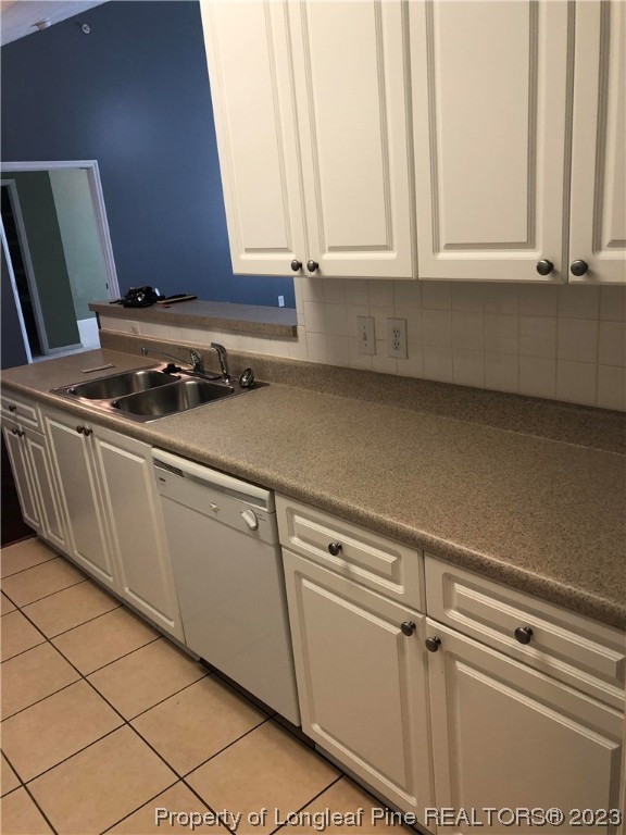 649 Brandermill Road, Unit 203 Fayetteville, NC 28314 - Photo 8 of 26 a kitchen with a sink and cabinets
