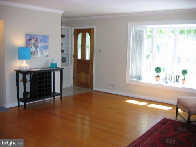 6015 22nd Road North Arlington, VA 22205 - Photo 2 of 16 a view of livingroom with furniture and window