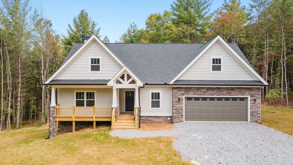 10 West Hawks Nest Road Blairsville, GA 30512 - Photo 26 of 40 a front view of a house with a yard and garage