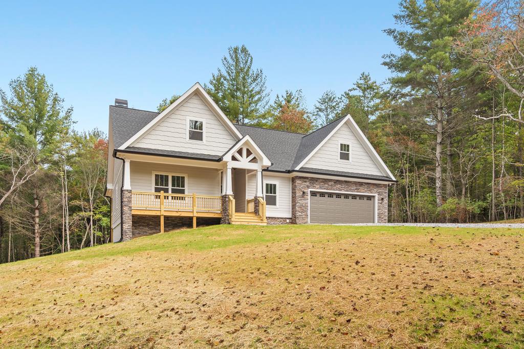 10 West Hawks Nest Road Blairsville, GA 30512 - Photo 28 of 40 a front view of a house with a yard and garage