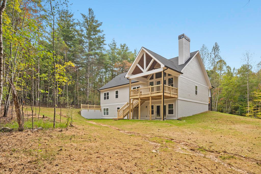 10 West Hawks Nest Road Blairsville, GA 30512 - Photo 29 of 40 a front view of a house with a yard and garage