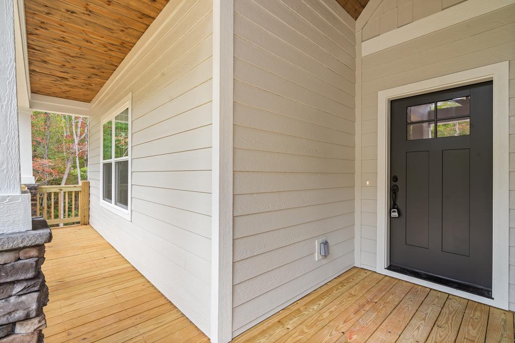 10 West Hawks Nest Road Blairsville, GA 30512 - Photo 32 of 40 a view of a balcony with wooden floor and cabinet