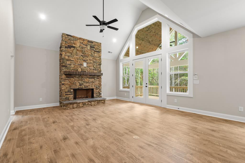 10 West Hawks Nest Road Blairsville, GA 30512 - Photo 35 of 40 a view of an empty room with a fireplace and a window